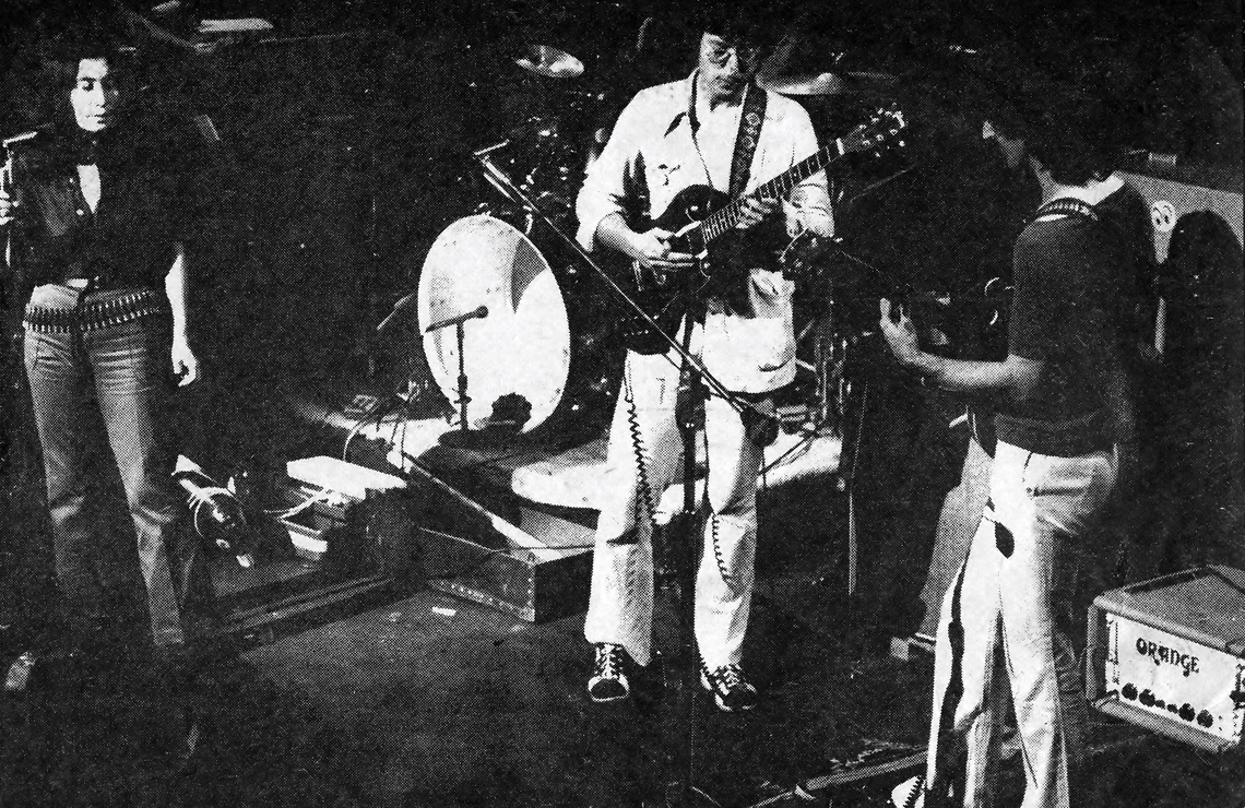 Yoko Ono, John Lennon, and Frank Zappa on stage in New York playing Orange Amps.